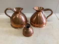Two Victorian copper four gallon haystack measures, one engraved “Empire Palace” and a half gallon