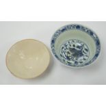 A Chinese blue and white porcelain bowl, Xuande mark but later and another bowl
