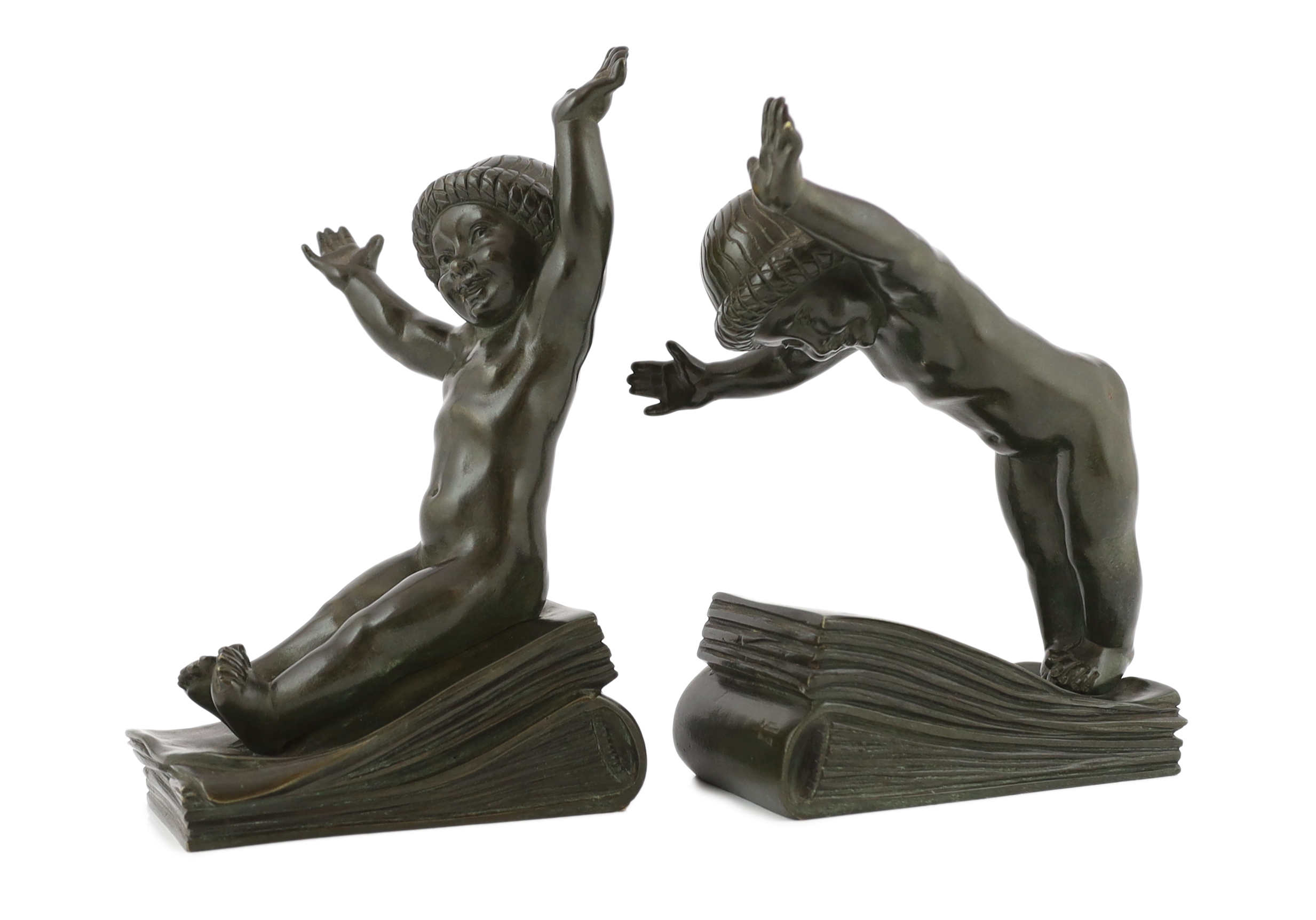 Claude (Claude-Marie Devenet 1851-1931), a pair of French Art Deco bronze bookends, Marcel