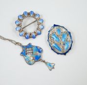 A George V silver and enamel set drop pendant (a.f.), 40mm on a white metal chain and two white