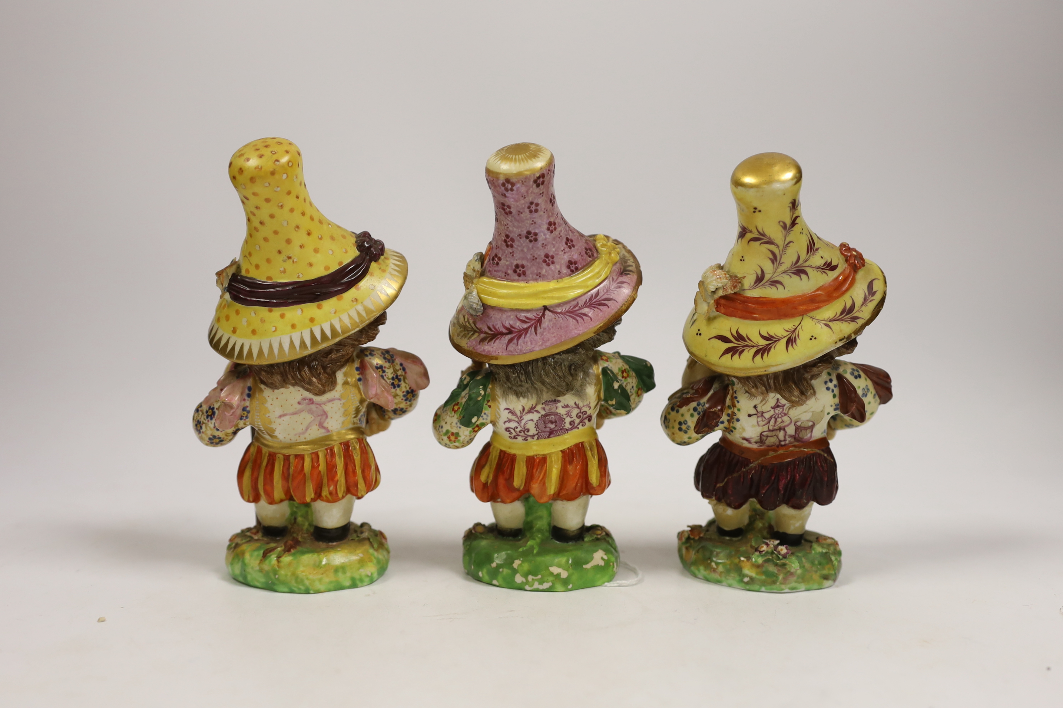 Three Derby porcelain Mansion House dwarves, c.1810-30, incised marks to the bases, 18cm high - Image 2 of 3