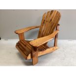 A stained pine Adirondack garden chair, width 78cm, depth 98cm, height 90cm