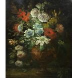 19th century Continental School, 17th century style still life of flowers in a vase upon a ledge,