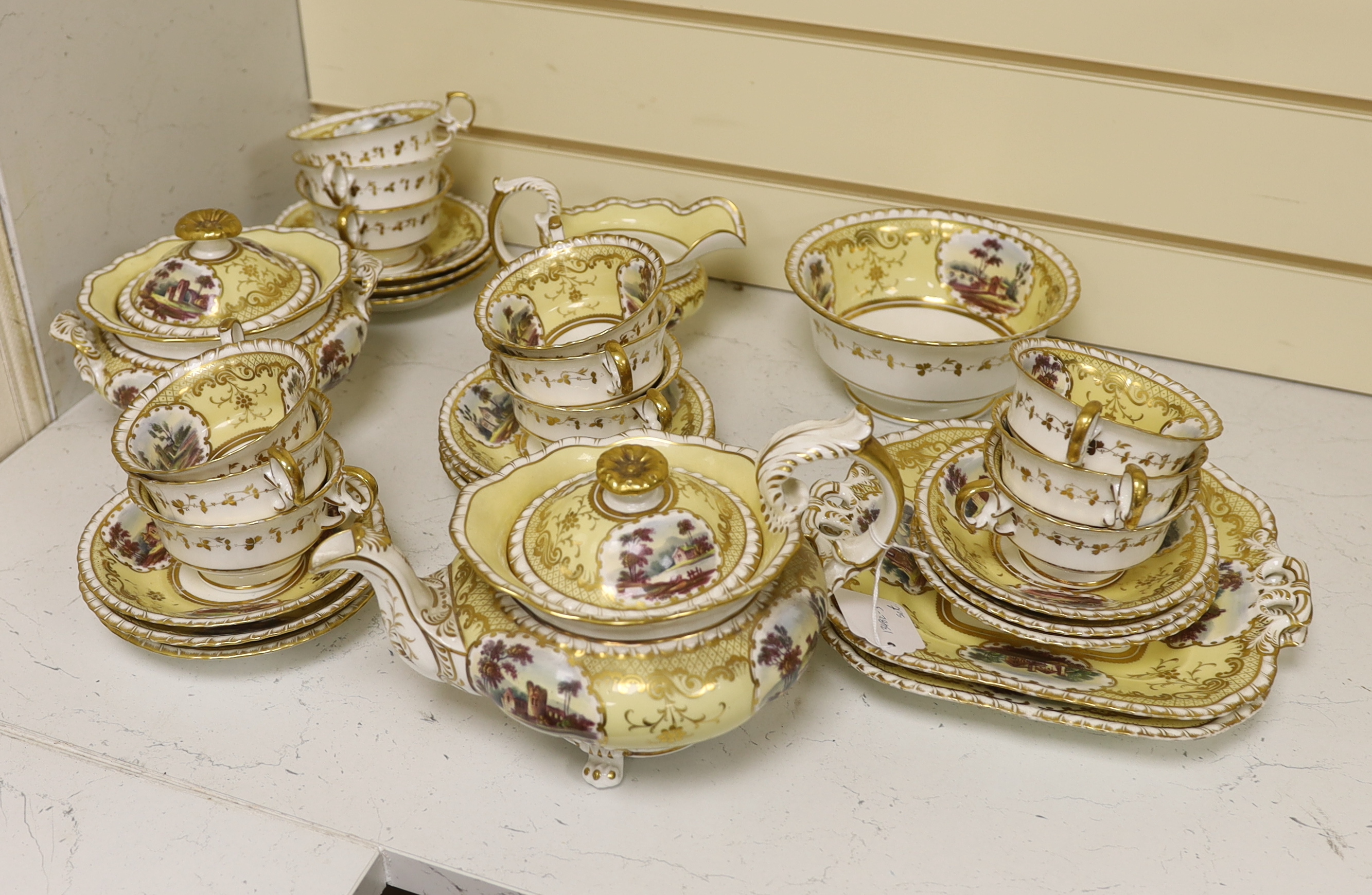 An English porcelain tea set, c.1835-45, including a teapot and cover, sucrier and cover, slops