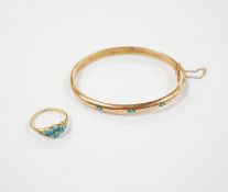 A Victorian yellow metal and three stone cabochon turquoise set hinged bangle, together with a