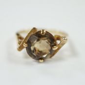 A 14k yellow metal and single stone citrine set dress ring, size N/O, gross weight 3.9 grams.