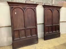 A pair of 18th century style carved oak panels, width 134cm, height 183cm