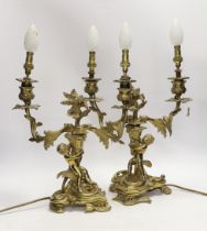 A pair of Victorian ormolu two branch candelabra, mounted as lamps, 48cm total including bulbs