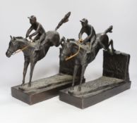 A pair of bronzed resin models of steeplechasers, 31cm