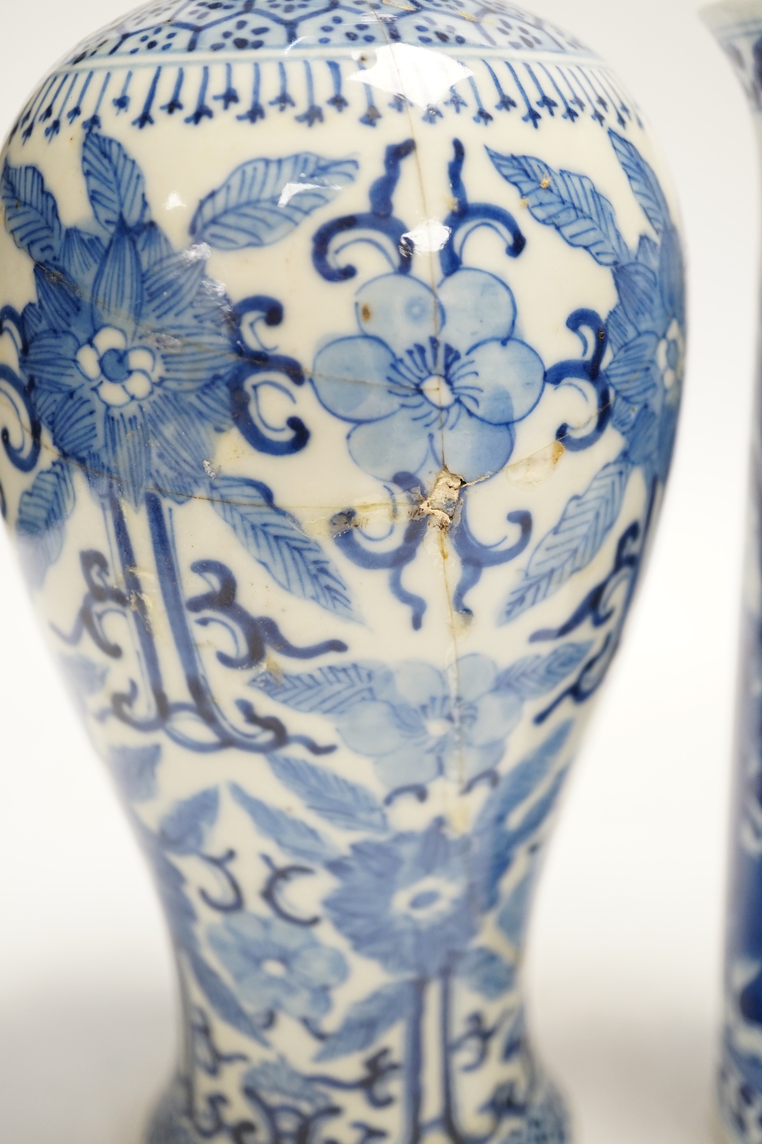 Two early 20th century Chinese blue and white vases, one restored, 23cm - Image 5 of 6