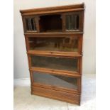 A Globe Wernicke oak four section bookcase, width 86cm, depth 27cm, height 140cm