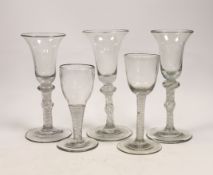 Five 19th century Dutch DSOT stem soda wine glasses, largest 17cm high