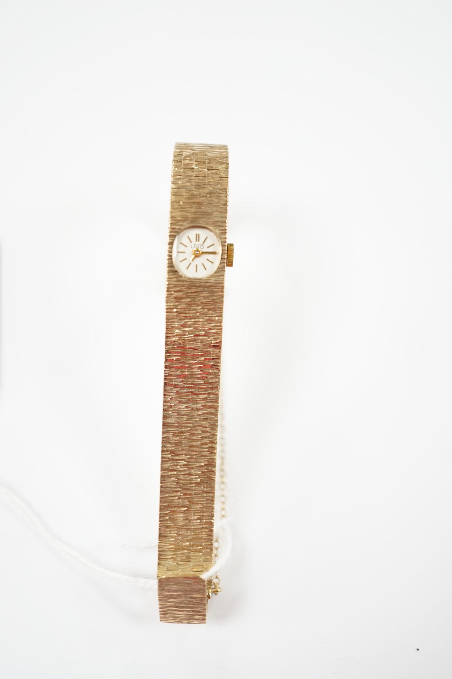 A lady's 1970's 9ct. gold Uno manual wind bracelet wrist watch with a bark textured bracelet, - Image 3 of 4