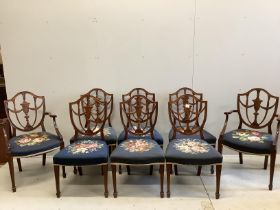 A set of eight Edwardian Hepplewhite style mahogany dining chairs with tapestry seats, two with