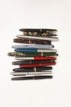 A collection of thirteen fountain pens by Parker, Mabie Todd, etc.