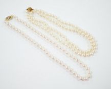 Two single strand cultured pearl necklaces, choker with 750 and diamond chip set clasp, 42cm, the