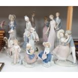 Collection of twelve Lladro figures including Precious Love and High Society