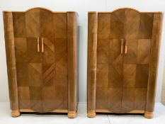 A pair of Art Deco walnut compactum wardrobes, width 116cm, depth 54cm, height 183cm