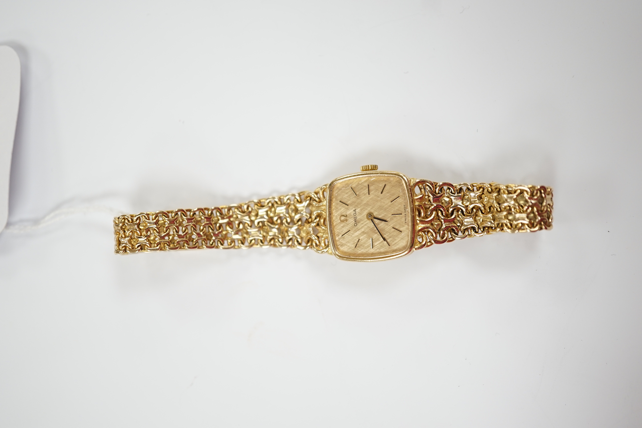 A lady's 1970's 9ct gold Omega manual wind wrist watch, on integral Omega 9ct gold bracelet, - Image 2 of 3