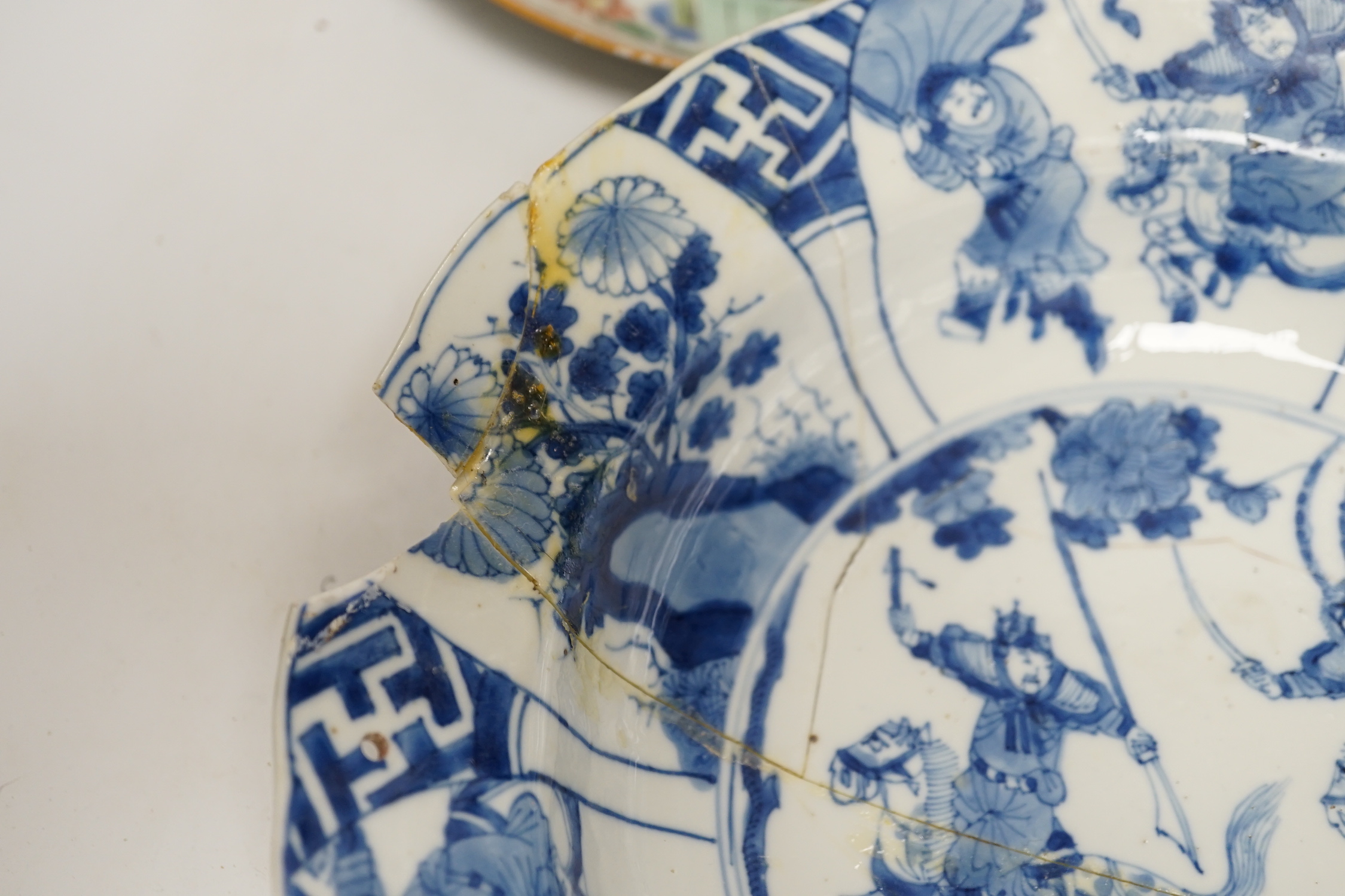 A Chinese blue and white ‘warriors’ bowl, Kangxi mark and period, a similar ‘hunting’ saucer dish, - Image 4 of 8