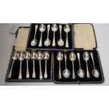 Three assorted cased sets of six silver tea or coffee spoons including Old English feather edge