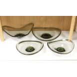 Four Holmegaard glass dishes, largest 39cm