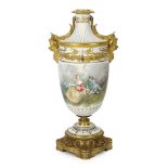 A large French porcelain and ormolu mounted vase, late 19th century, painted with courting couples