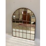 An industrial style cast iron arched window wall mirror, width 92cm, height 115cm