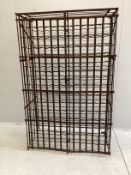 A French wrought iron wine cage, width 102cm, depth 55cm, height 162cm