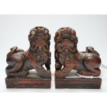 Two Japanese carved and lacquered hardwood Temple dogs, late Tokugawa period, 16cm wide