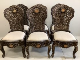 A set of six Indian carved hardwood chairs inset circular portrait plaques, width 48cm, depth