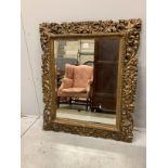 A Florentine style giltwood and composition wall mirror, width 83cm, height 100cm