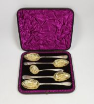 A cased George III matched silver five piece serving and sifter berry spoon set, two spoons by Eley,