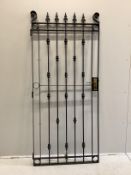 A black painted wrought iron garden gate, width 85cm, height 191cm