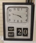 A modern industrial style wall clock / calendar, 90cm high