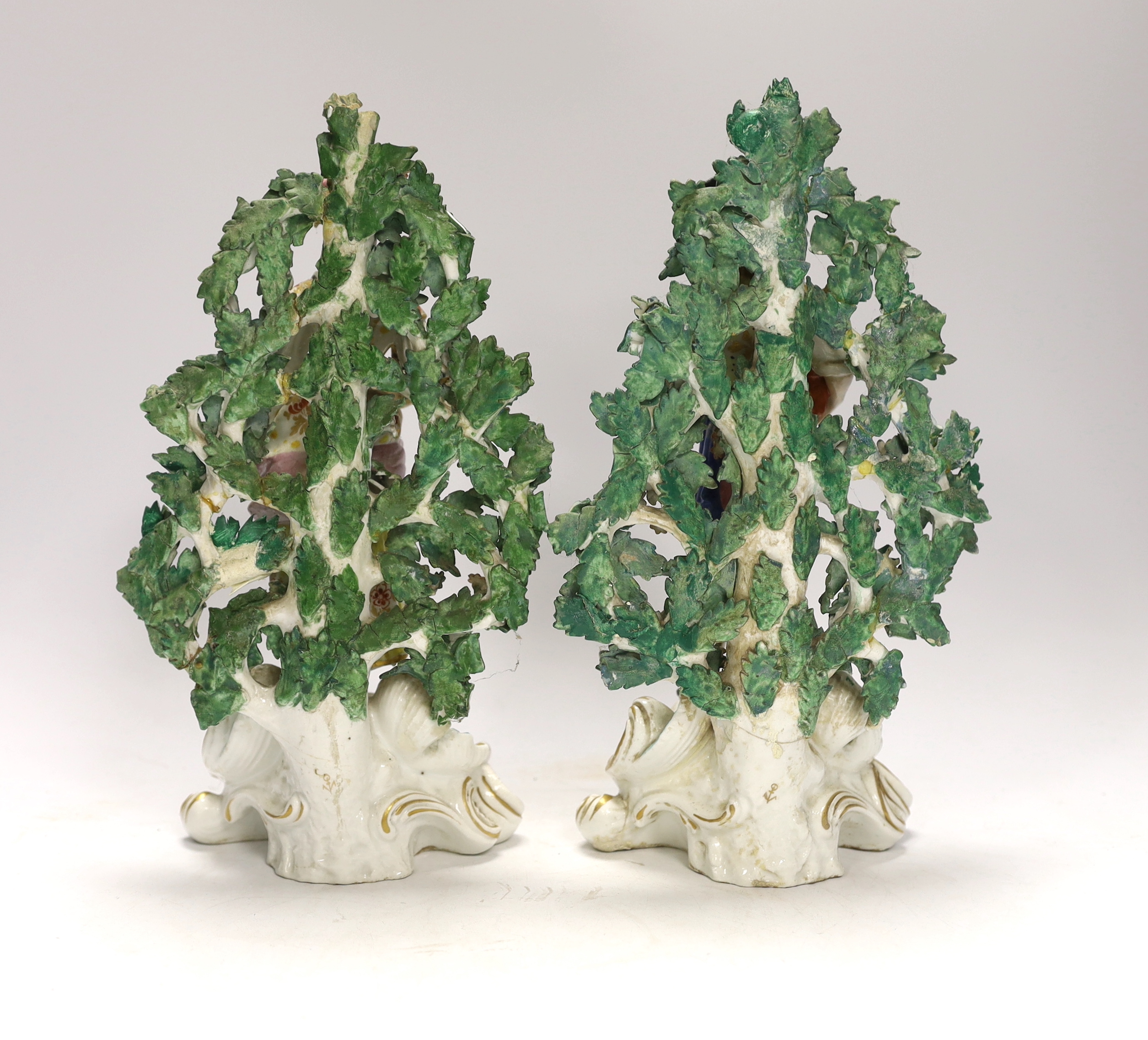 A pair of Continental porcelain figures of gardeners, pseudo Chelsea marks, 28cm high - Image 2 of 3