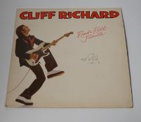 A signed Cliff Richard LP record album; Rock ‘n’ Roll Juvenile, EMC3307, signed in ballpoint ink