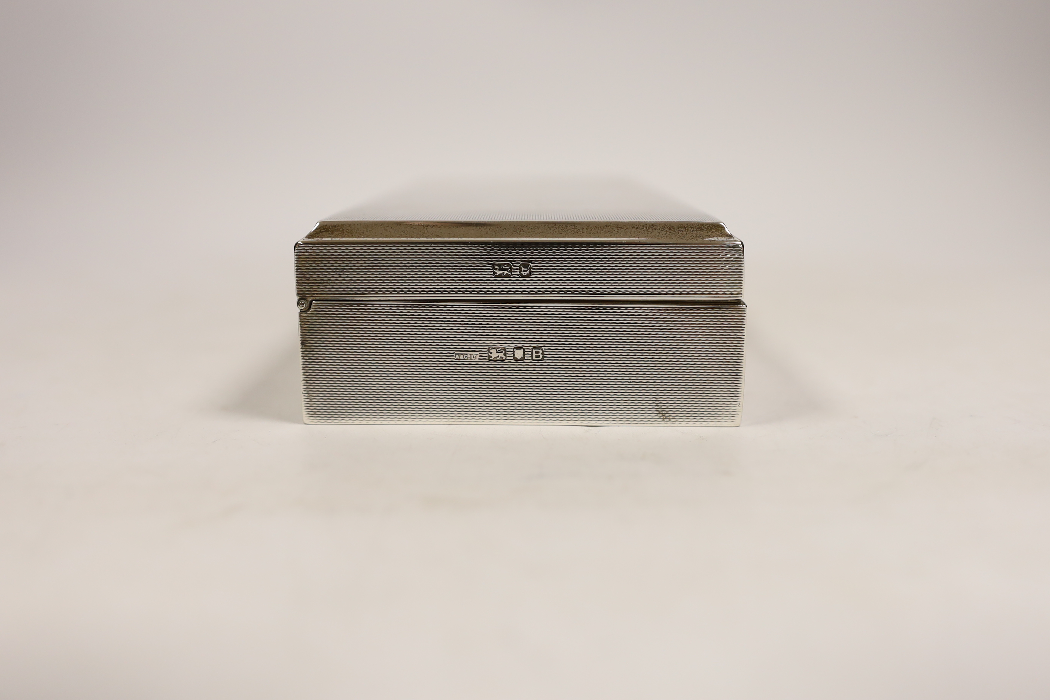 A George VI engine turned silver mounted rectangular cigarette box, Asprey & Co Ltd, London, 1937, - Image 2 of 3