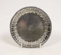 A George III Irish silver small dish, with repousse border and engraved crest, by Matthew West,