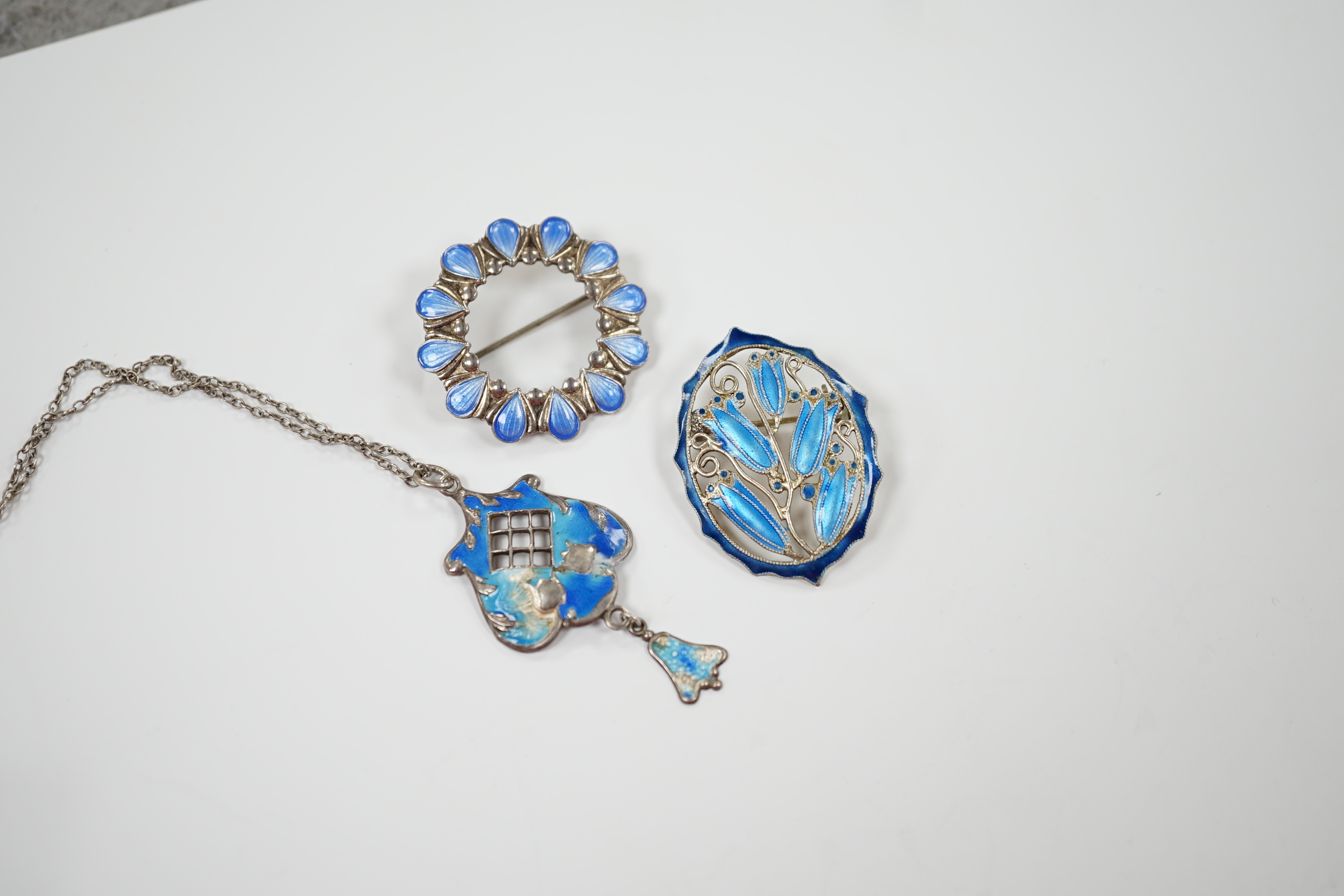 A George V silver and enamel set drop pendant (a.f.), 40mm on a white metal chain and two white - Image 2 of 3