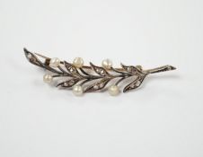 An early 20th century yellow metal, cultured pearl and rose cut diamond set foliate spray brooch,