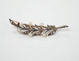 An early 20th century yellow metal, cultured pearl and rose cut diamond set foliate spray brooch,