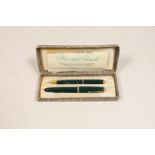 A cased Parker pen Duofold pen and pencil set