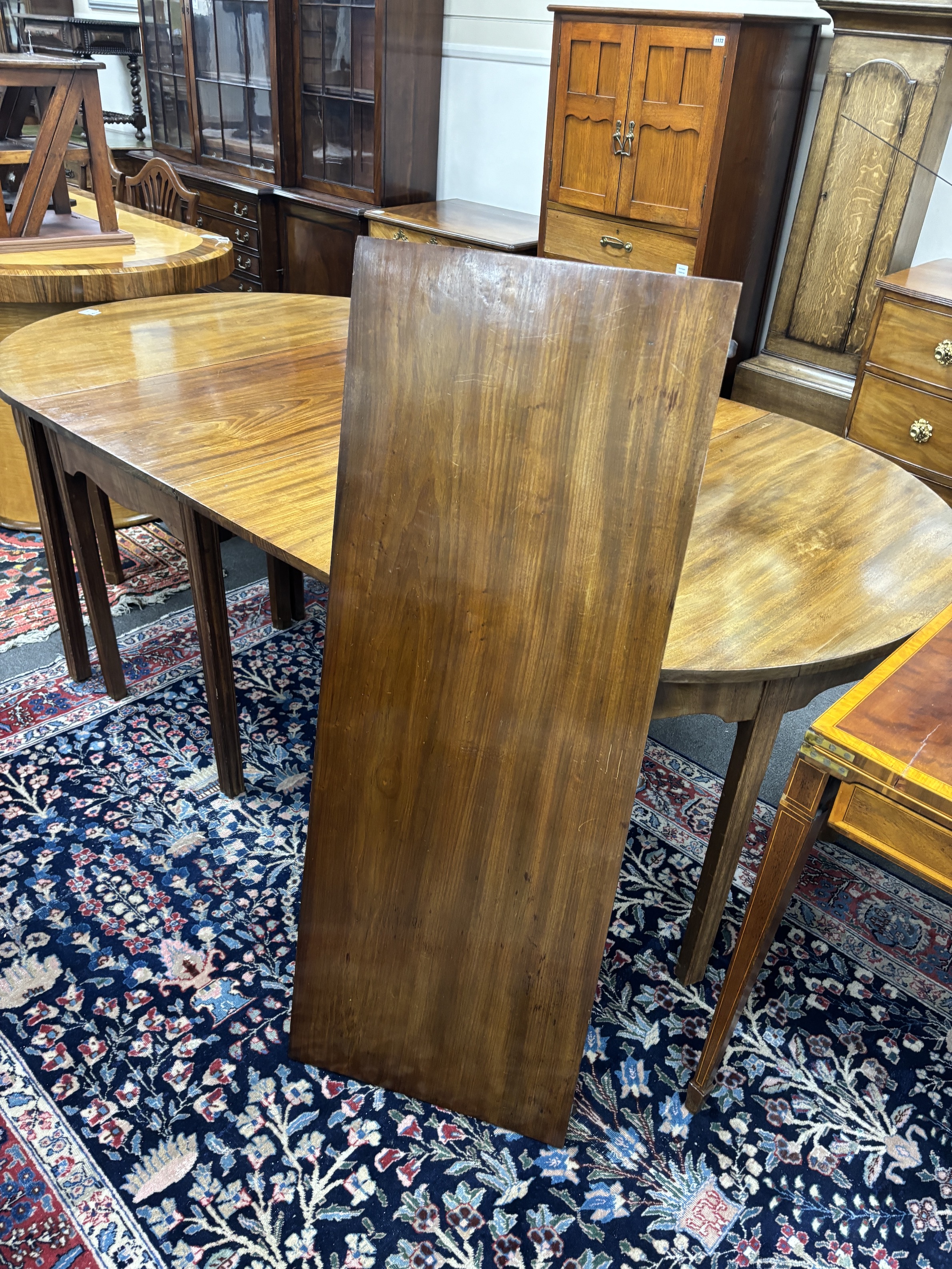 A George III mahogany D end extending dining table, 264cm extended, three spare leaves, width 121cm, - Image 4 of 4