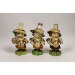 Three Derby porcelain Mansion House dwarves, c.1810-30, incised marks to the bases, 18cm high