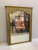 A French Art Deco giltwood and composition overmantel mirror, width 94cm, height 130cm