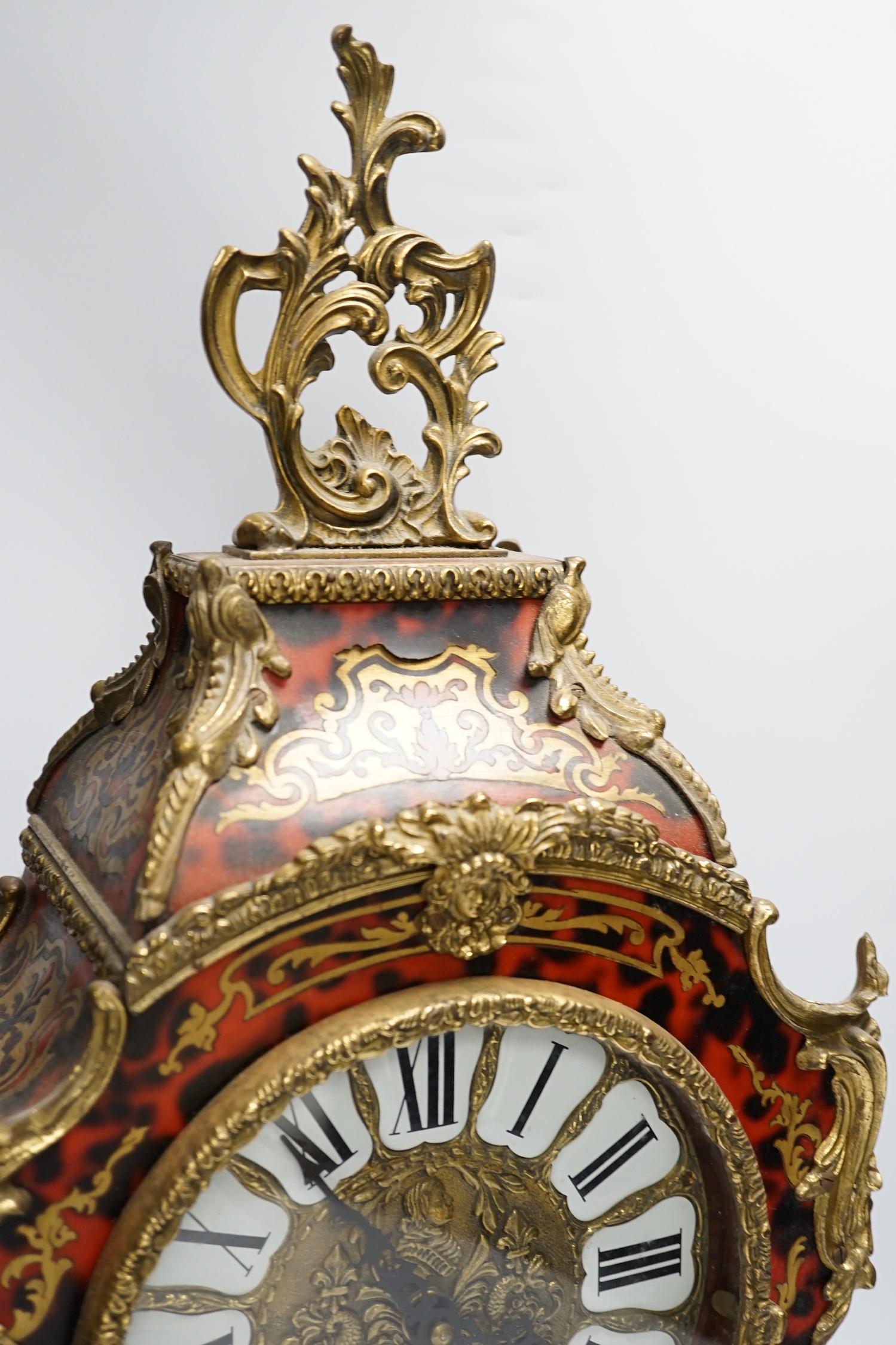 A simulated tortoiseshell Boulle work mantel clock, striking on a bell, 57cm high - Image 2 of 5