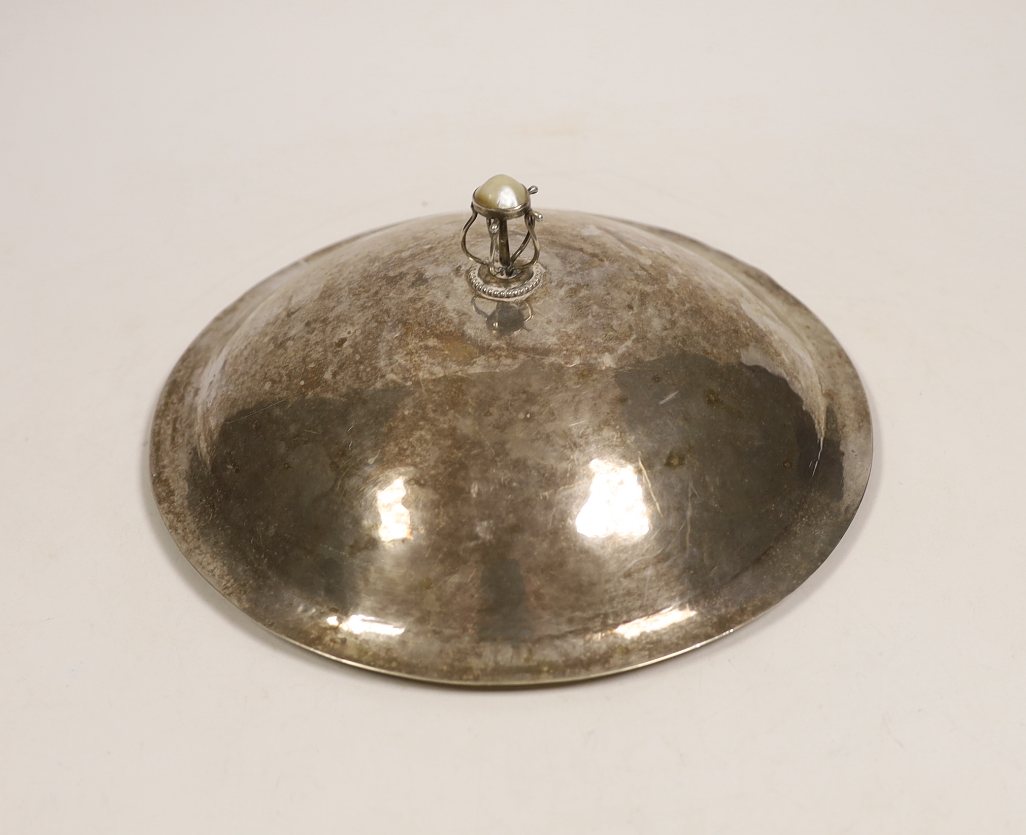 A Charles Robert Ashbee, Guild of Handicraft late Victorian hammered silver muffin dish cover,