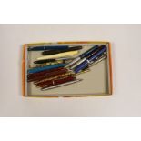 A collection of fountain pens and propelling pencils by Parker, etc. and a small penknife (17)