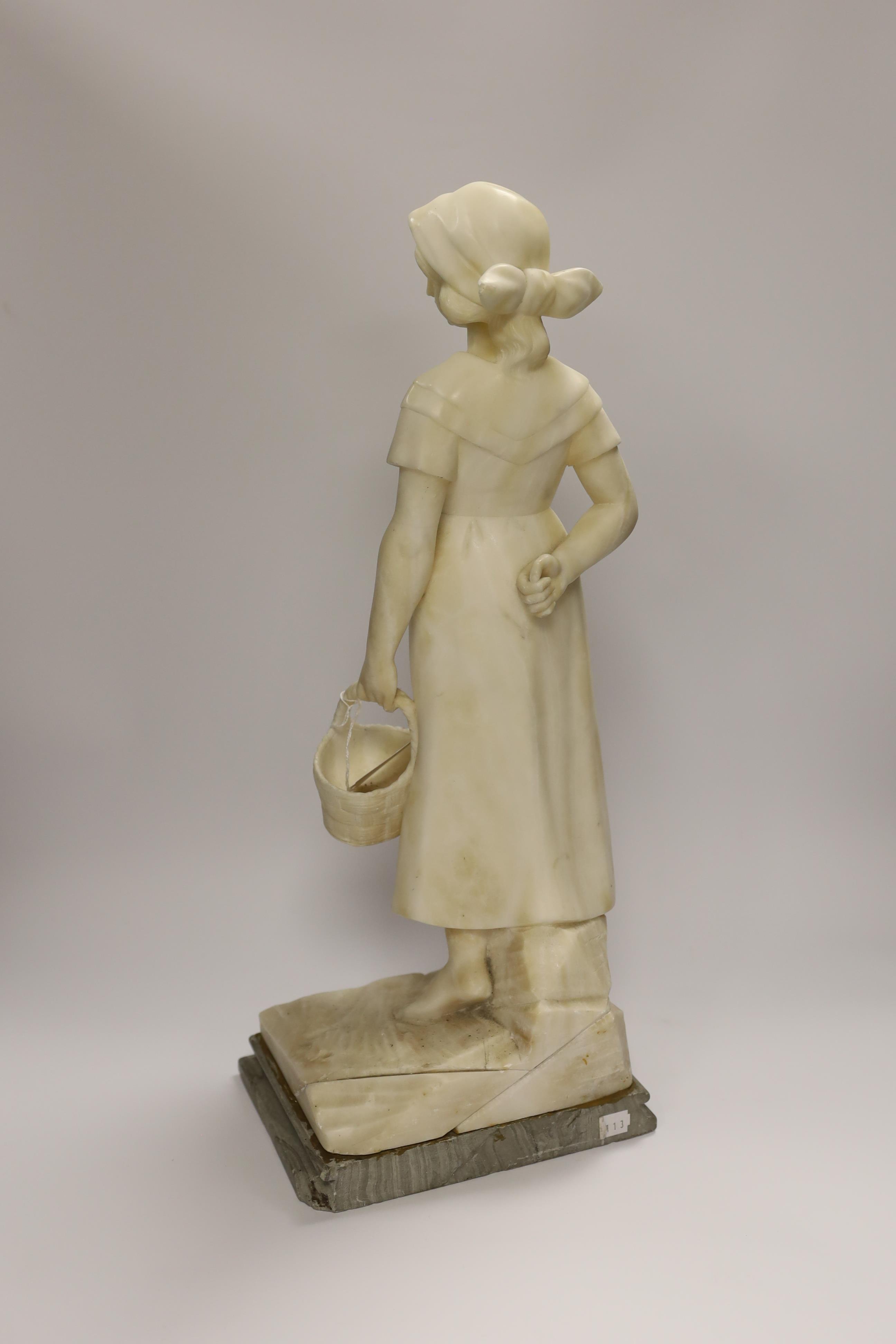 An alabaster carved figure of a girl holding a basket, 51cm high - Image 3 of 3